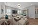 Bright living room with comfy seating and large TV at 111 172Nd E St, Bradenton, FL 34212