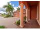 Inviting house exterior featuring a three-car garage and a red-tiled roof at 111 172Nd E St, Bradenton, FL 34212
