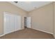 Spacious bedroom with carpeted floor and double door closet at 111 172Nd E St, Bradenton, FL 34212