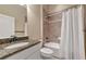 Bathroom with granite countertop, single sink, and shower/tub combo at 111 172Nd E St, Bradenton, FL 34212