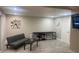 Cozy basement features a sleeper sofa, workspace, and ample floor space at 2244 Palm Ter, Sarasota, FL 34231