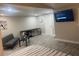 Bright bedroom with a comfortable bed, and a small sitting area at 2244 Palm Ter, Sarasota, FL 34231
