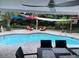 Inviting pool area with lounge chairs and patio furniture at 2244 Palm Ter, Sarasota, FL 34231