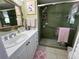 Clean bathroom with tiled shower and white vanity at 6812 11Th W Ave # 6812, Bradenton, FL 34209