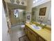 Cozy bathroom featuring a shower-tub combination and classic fixtures and decor at 6812 11Th W Ave # 6812, Bradenton, FL 34209