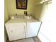 Functional laundry area featuring a clean and efficient washer and dryer set at 6812 11Th W Ave # 6812, Bradenton, FL 34209
