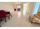 Open-concept living room featuring tile flooring and ample space for entertaining and relaxing at 6812 11Th W Ave # 6812, Bradenton, FL 34209