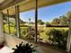 View from lanai shows lush landscaping and community pool at 6812 11Th W Ave # 6812, Bradenton, FL 34209