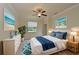 Cozy bedroom with a comfortable bed and stylish decor at 7114 Quiet Creek Dr, Bradenton, FL 34212
