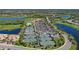Aerial view of River Strand tennis courts and community clubhouse at 7114 Quiet Creek Dr, Bradenton, FL 34212