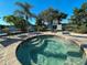 Community hot tub with lounge chairs, perfect for relaxation at 7114 Quiet Creek Dr, Bradenton, FL 34212