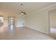 Bright living room with tile floors and neutral color walls at 7114 Quiet Creek Dr, Bradenton, FL 34212