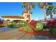 Tennis center with clubhouse and landscaping at 7114 Quiet Creek Dr, Bradenton, FL 34212