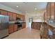 Modern kitchen with granite countertops and stainless steel appliances at 7114 Quiet Creek Dr, Bradenton, FL 34212