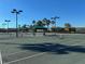 Well-maintained tennis courts with ample space and lighting at 7114 Quiet Creek Dr, Bradenton, FL 34212