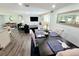 Dining area with a dark wood table and light colored upholstered chairs at 2244 Palm Ter, Sarasota, FL 34231