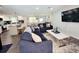 Open living room and kitchen with modern appliances and stylish furniture at 2244 Palm Ter, Sarasota, FL 34231