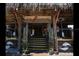 Entrance to The Cottage restaurant with steps leading to the door at 2244 Palm Ter, Sarasota, FL 34231