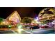 Night view of Daiquiri Deck restaurant with outdoor seating and lively atmosphere at 2244 Palm Ter, Sarasota, FL 34231