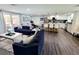 Open concept living and kitchen area with modern finishes and a view to backyard at 2244 Palm Ter, Sarasota, FL 34231
