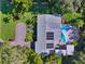 Beautiful home with a large yard, pool, and solar panels at 2244 Palm Ter, Sarasota, FL 34231