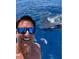 A Personal smiling for a selfie with a whale shark in the ocean at 2244 Palm Ter, Sarasota, FL 34231