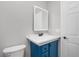 Modern bathroom with a blue vanity and LED mirror at 300 River S Blvd, Nokomis, FL 34275