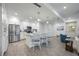 Modern kitchen with stainless steel appliances and white cabinets at 383 Aruba Cir # 101, Bradenton, FL 34209