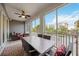 Relaxing screened balcony with seating and outdoor dining at 383 Aruba Cir # 101, Bradenton, FL 34209