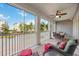 Enjoyable screened balcony with seating and outdoor dining at 383 Aruba Cir # 101, Bradenton, FL 34209