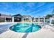 Resort-style pool with surrounding patio and lounge area at 383 Aruba Cir # 101, Bradenton, FL 34209