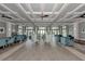 Spacious community room with hardwood floors and seating at 383 Aruba Cir # 101, Bradenton, FL 34209