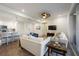 Spacious living room with comfortable sofas and a large TV at 383 Aruba Cir # 101, Bradenton, FL 34209