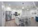 Modern kitchen with stainless steel appliances and white cabinets at 383 Aruba Cir # 101, Bradenton, FL 34209