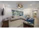 Open living room features a comfortable seating area and hardwood floors at 383 Aruba Cir # 101, Bradenton, FL 34209