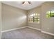 Spacious bedroom with neutral walls and carpet at 235 Dahlia Ct, Bradenton, FL 34212