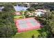 Two lighted tennis courts in a community setting at 235 Dahlia Ct, Bradenton, FL 34212