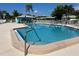 Community pool with a relaxing patio area at 6812 11Th W Ave # 6812, Bradenton, FL 34209