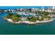Aerial view of a waterfront park, marina, and city skyline at 1663 4Th St, Sarasota, FL 34236