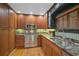 Kitchen with granite countertops and stainless steel appliances at 1663 4Th St, Sarasota, FL 34236