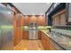 Kitchen with granite countertops and stainless steel appliances at 1663 4Th St, Sarasota, FL 34236
