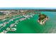 Aerial view of a marina with numerous boats docked at the waterfront at 1663 4Th St, Sarasota, FL 34236