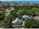 Aerial view of property, showing a charming home with metal roof at 1663 4Th St, Sarasota, FL 34236