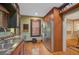 Laundry room with washer, dryer, and built-in shelving at 1663 4Th St, Sarasota, FL 34236