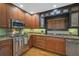 Kitchen with granite countertops and stainless steel appliances at 1663 4Th St, Sarasota, FL 34236