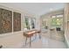 Home office with built-in desk and access to backyard at 1663 4Th St, Sarasota, FL 34236