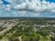 Aerial view of a residential area with lush green spaces at 1663 4Th St, Sarasota, FL 34236