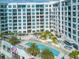 Luxury building with a resort-style pool and courtyard at 111 S Pineapple Ave # 1009, Sarasota, FL 34236