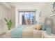 Bright bedroom with city view and stylish decor at 111 S Pineapple Ave # 1009, Sarasota, FL 34236