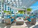 Gather around the fire pit with friends and Gathering under the pergola at 111 S Pineapple Ave # 1009, Sarasota, FL 34236